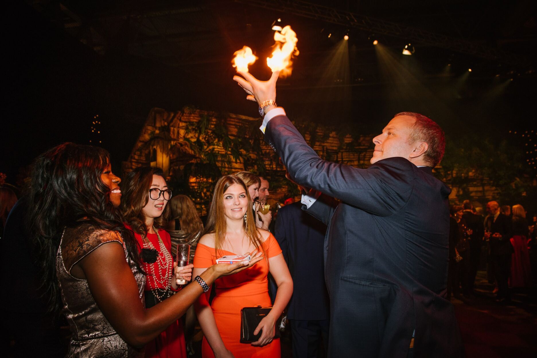 Spencer Lynch performing fire magic for an audience